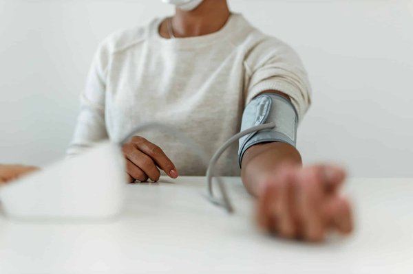 What are the long-term cardiovascular benefits of regular rowing?